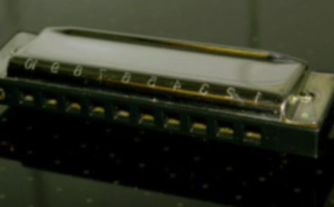 縈繞耳畔的口琴聲初二作文